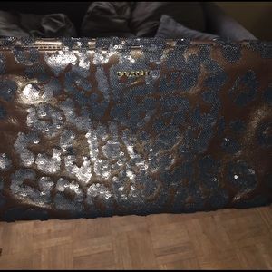 COPY - Coach extra large sequin leopard wristlet/…